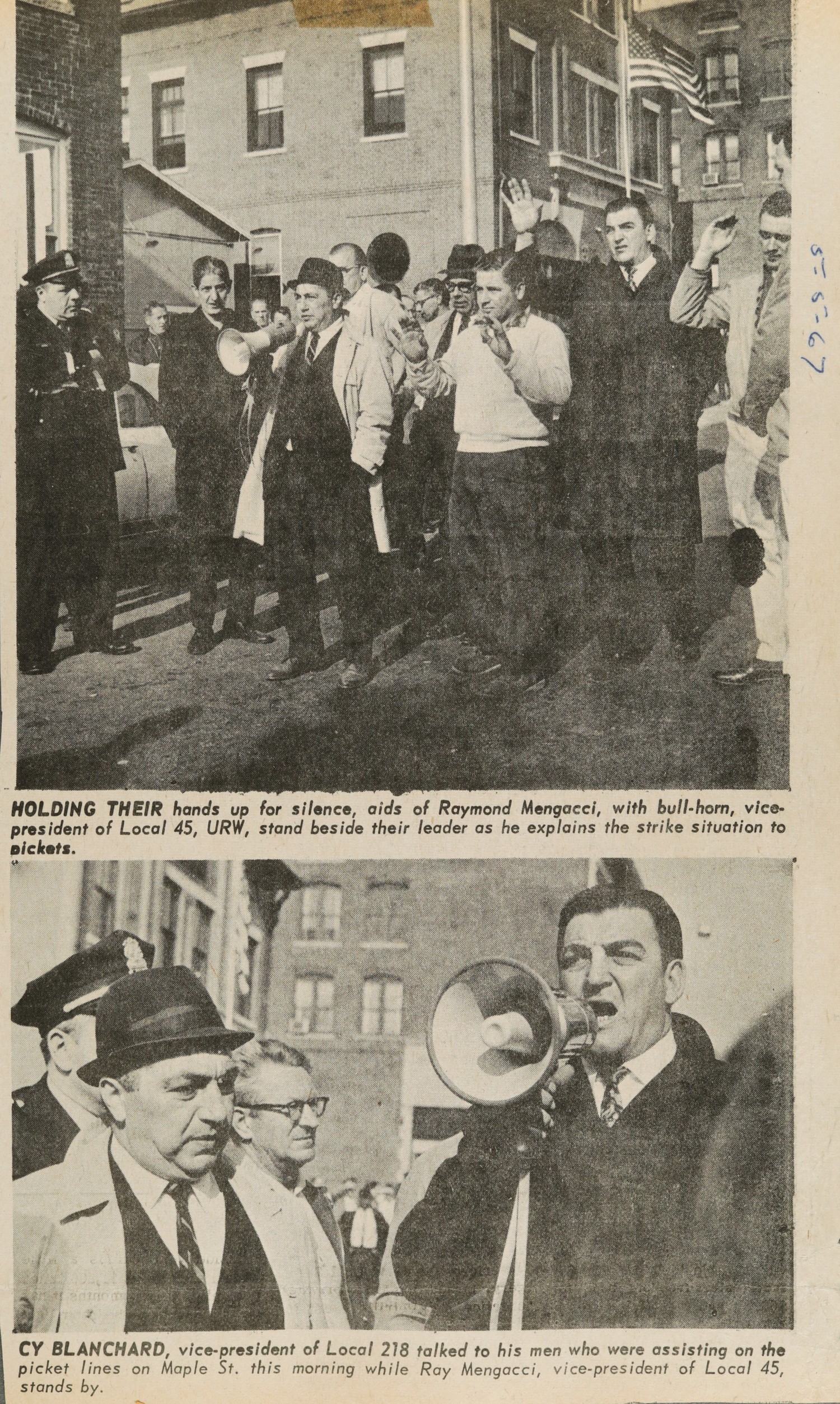 HOLDING THEIR hands up for silence, aids of Raymond Mengacci, with bull-horn, vice-president of Local 45, URW, stand beside their leader as he explains the strike situation to pickets.